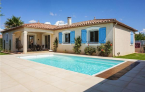 Nice home in Puisserguier with Outdoor swimming pool and 2 Bedrooms